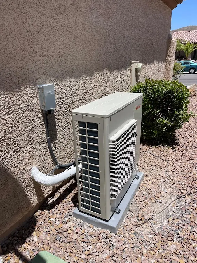 Residential air conditioning condenser unit in Prien